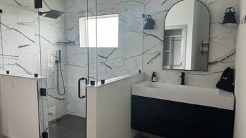 Shower, hair dryer, towels