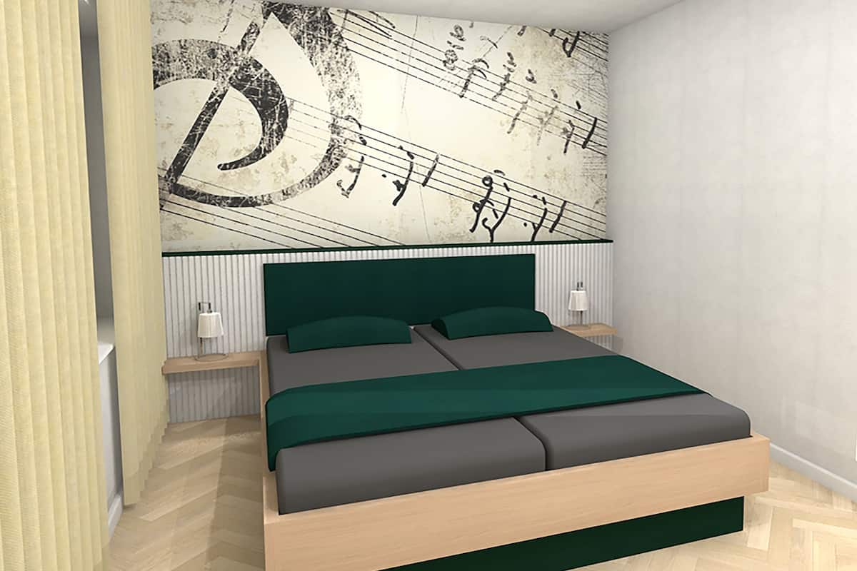 A modern bedroom with a bed, bedside tables, and a wall with a large musical note design.