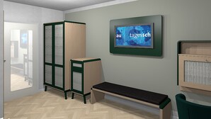 A room with a bench, a cabinet, and a wall-mounted screen displaying 'au tagessch'. - Hotel Klippenklang (Helgoland)