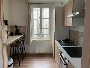 Fridge, coffee/tea maker, electric kettle, toaster