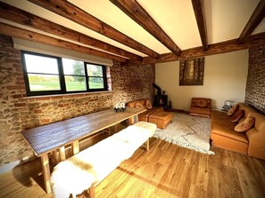 Smart TV, fireplace, books, printers