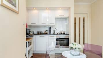 Deluxe Apartment, Accessible, Private Bathroom | Private kitchen | Full-sized fridge, microwave, oven, dishwasher