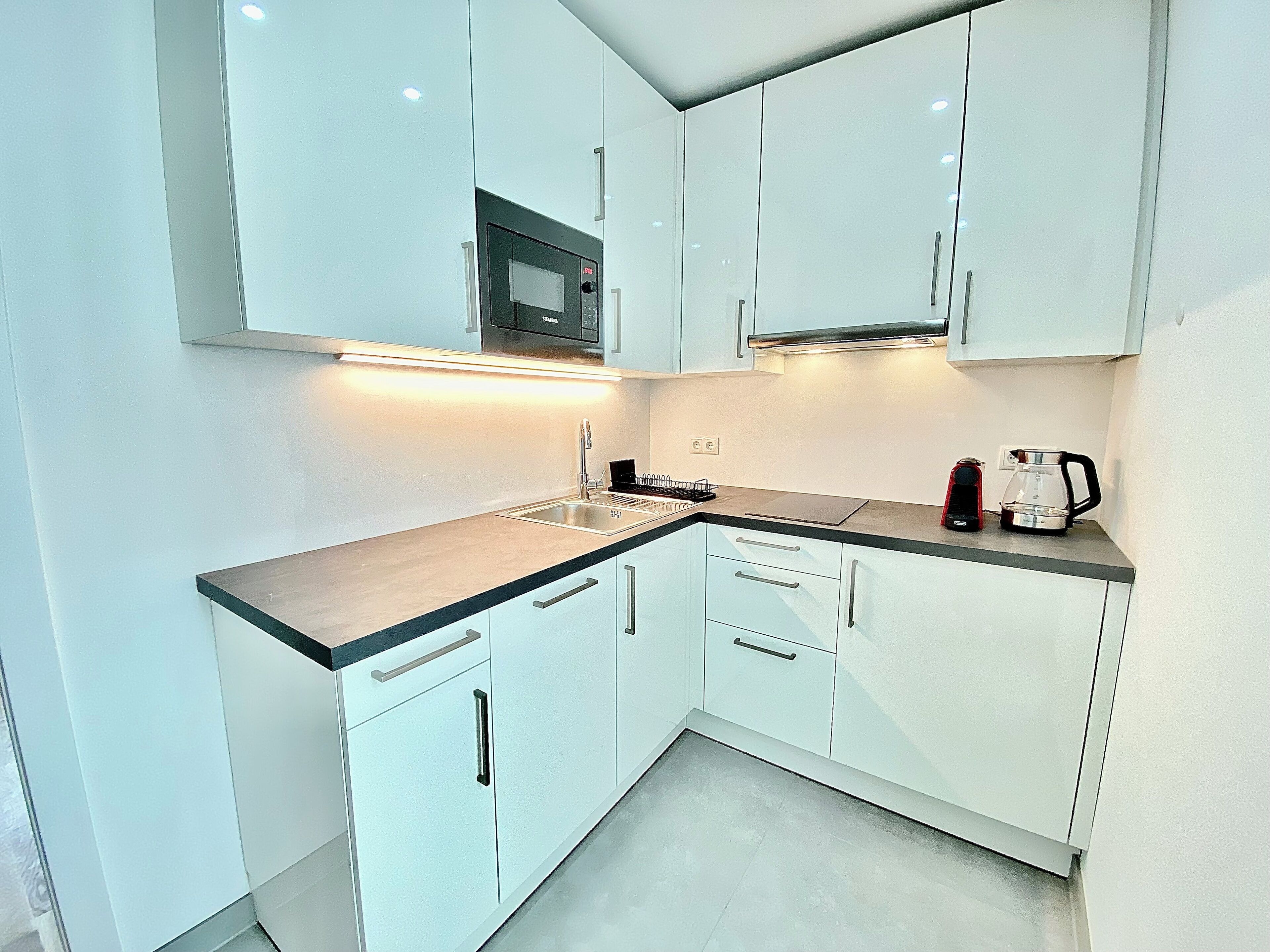 Mini-fridge, microwave, stovetop, dishwasher