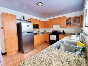 Deluxe Apartment, Kitchen | Private kitchen