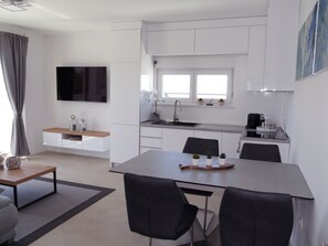 Exclusive Apartment | Living area | 102-cm LCD TV with satellite channels - Nova Excellence (Novalja)