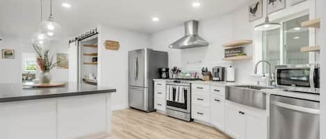 Fridge, oven, cookware/dishes/utensils