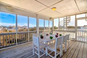Outdoor dining - Sunrise views and a quick walk to the beach access at Ricky's Retreat Too! (Corolla)