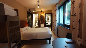 Desk, laptop workspace, free WiFi, bed sheets