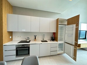 Private kitchen - Cozy 1-bedroom hotel suites in a luxury hotel with over 20 lifestyle amenities (Dubai)