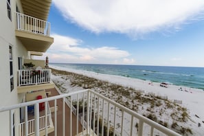 A beachfront hotel with a balcony overlooking the ocean. - Sans Souci Unit 307 (Pensacola Beach)