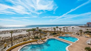 Apartment, Multiple Beds (Emerald Isle unit 202) | Pool | Outdoor pool, a heated pool
