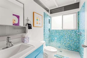 Shower, hair dryer, shampoo