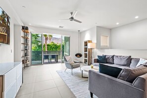 TV, fireplace - Chic and Stylish at The Riv (Palm Springs)