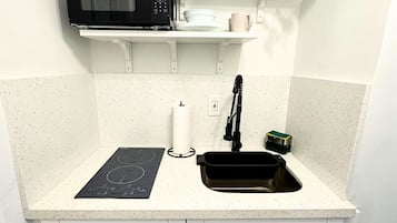 Superior Suite | Private kitchen | Fridge, microwave, stovetop, coffee/tea maker