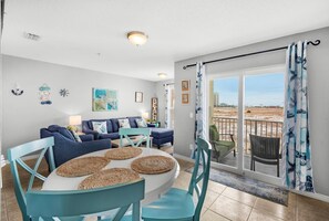Apartment, Multiple Beds (Gulf Island 313) | Living area | TV - Gulf Island 313 (Navarre)