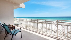 A balcony with a view of the beach and ocean. - Seahorse Unit H (Pensacola Beach)