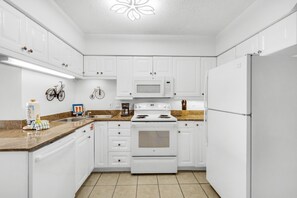 Departamento, 1 cama Queen size y sofá cama (Sundunes 112) | Cocina privada | Horno, tostadora y toallas de papel 