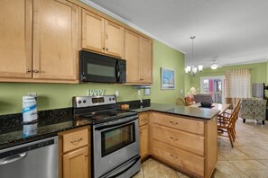 Apartment, Multiple Beds (Villas on the Gulf unit J1) | Private kitchen