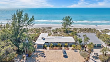 On the beach, sun-loungers