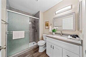 Shower, eco-friendly toiletries, hair dryer, towels