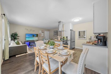 Cook a meal or order in, the dining space is the perfect setting for six