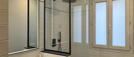 Shower, towels, soap, shampoo