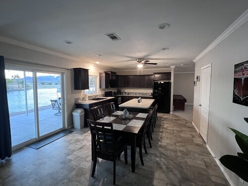 The One More
On the water with semi private beach and launch