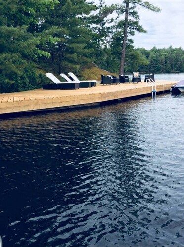 Secluded Muskoka Gem: Spacious Cottage with Private Sandy Beach & Expansive Dock