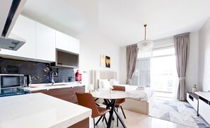 Fridge, microwave, dining tables