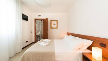 Standard Double Room | Down comforters, in-room safe, desk, blackout drapes