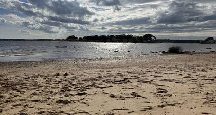 Quick walk to private beach from this brand new 3-bedroom cottage