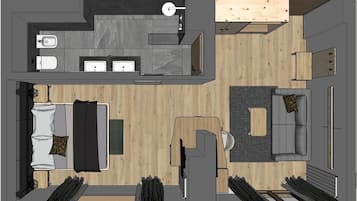 Distribución moderna de una habitación de hotel con baño, una pequeña zona de estar, cama y sofá.