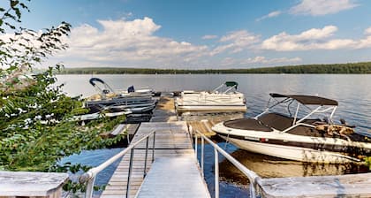 Lakefront condo with on-site pool, dock, swimming, firepit, & tennis