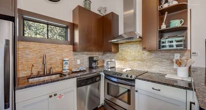 Home steps from the beach with plunge pool, gas grill, scenic balcony, & AC