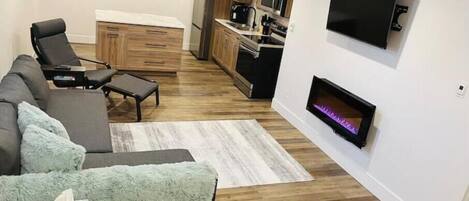 Smart TV, fireplace, books