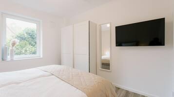 2 chambres, fer et planche à repasser, accès au Wi-Fi (inclus)