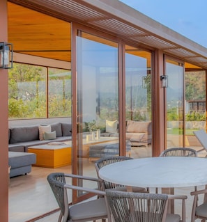 Casa superior | Terraço/pátio