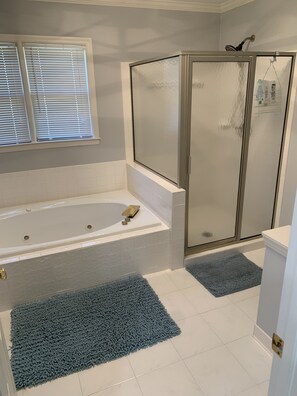 Jetted tub, hair dryer, towels, soap