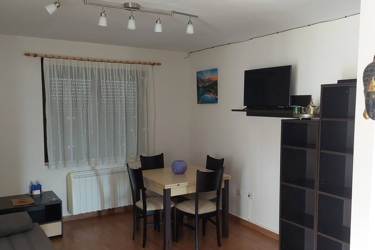Apartment, Sea View | Living area | 24-inch TV with digital channels