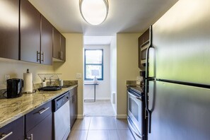 Fridge, microwave, oven, dishwasher - Luxe Old Town 2BR w/ Rooftop Deck & Gym, nr Green Space, by Blueground (Portland)