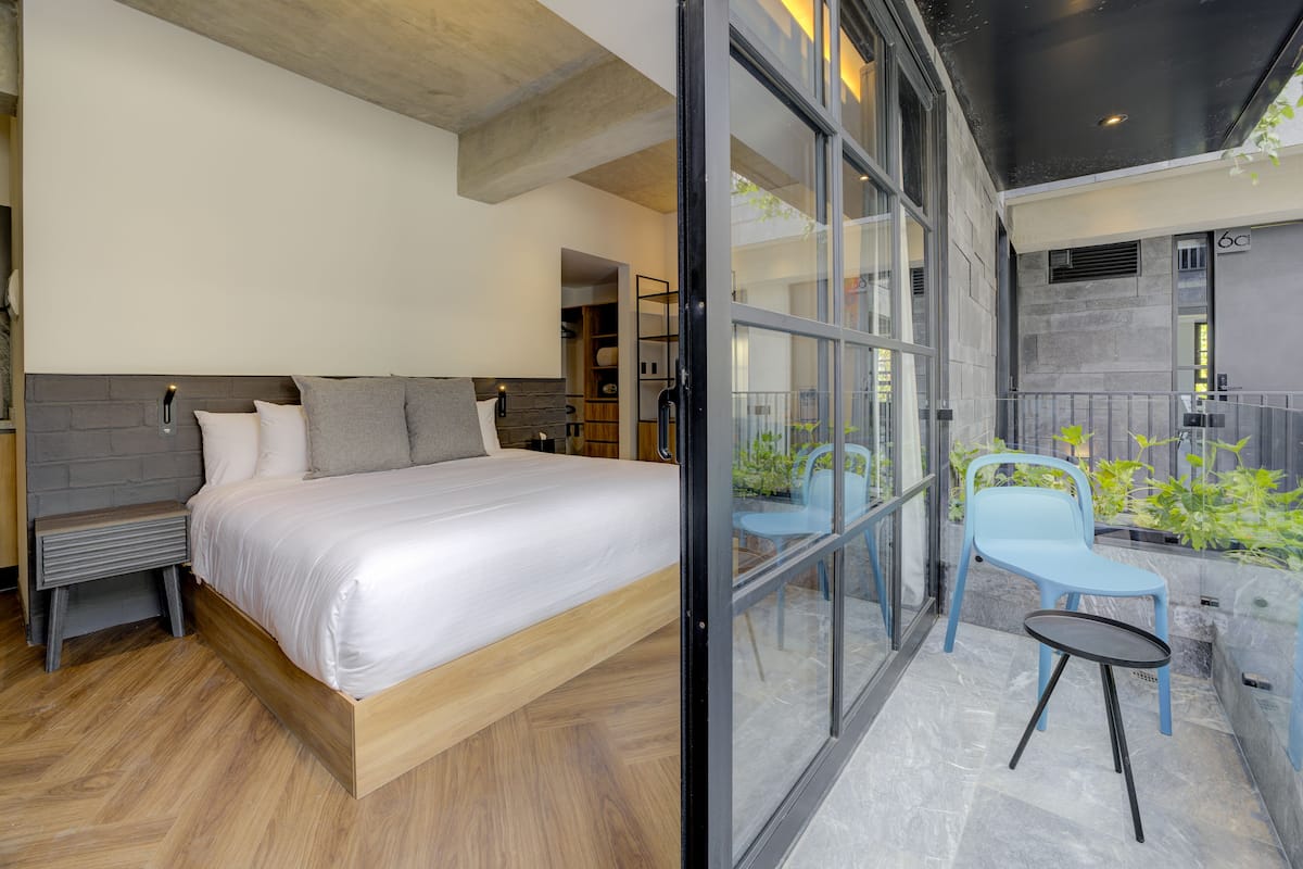 Premium Loft, Balcony, Courtyard Area | 2 bedrooms, in-room safe, individually decorated, individually furnished