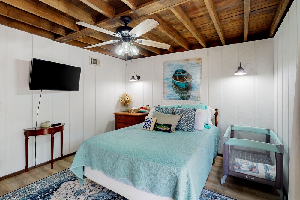 Lakefront retreat with kayaks, grill, games, open interior, & W/D dog