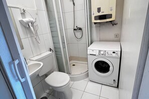 Shower, hair dryer, shampoo