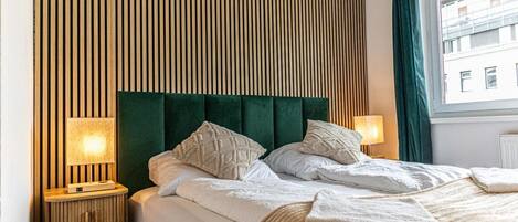 1 slaapkamer, een strijkplank/strijkijzer, wifi, beddengoed