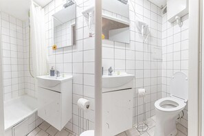 Hair dryer, towels, soap, shampoo