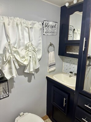 Shower, towels, soap, shampoo