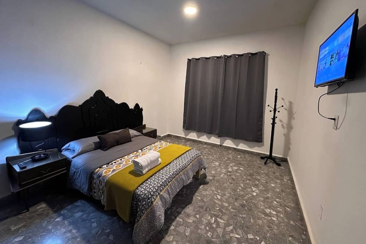 Blackout drapes, iron/ironing board (on request), WiFi (free)