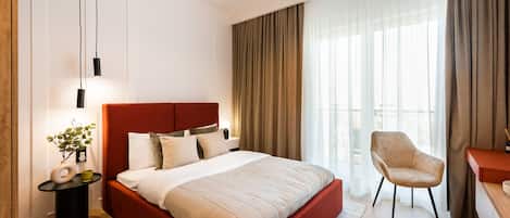 Tabla de planchar con plancha, wifi y ropa de cama
