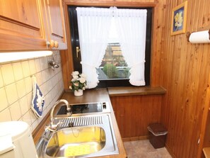 Fridge, stovetop, coffee/tea maker, electric kettle