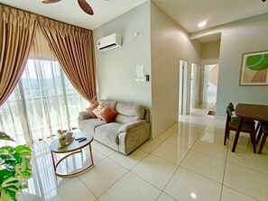 Executive Apartment | Living area | 24-inch Smart TV with digital channels - The Horizon Ipoh Emerald By Grab A Stay (Ipoh)